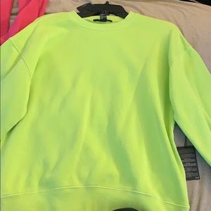 Neon green sweater